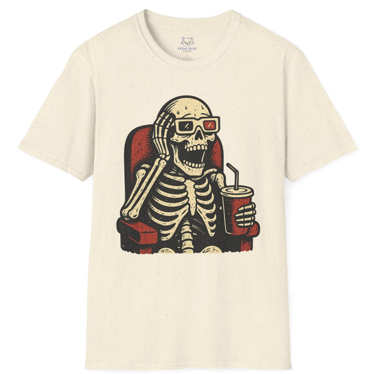 Cream t-shirt with a skeleton design wearing 3-d glasses, sitting in a theater seat, and holding a drink
