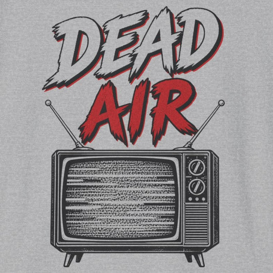 A light gray heather crewneck t-shirt featuring a graphic print on the front with the words 'DEAD AIR' in stylized red and white lettering above a retro television set illustration.