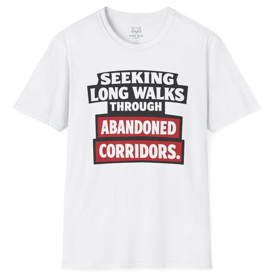 White t-shirt with text 'Seeking long walks through abandoned corridors' on a white background