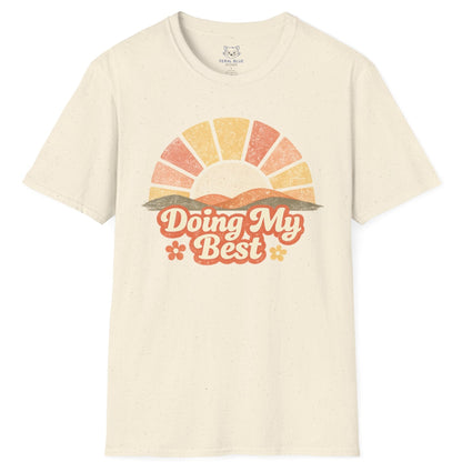 Beige t-shirt with a colorful graphic and 'Doing My Best' text on a white background