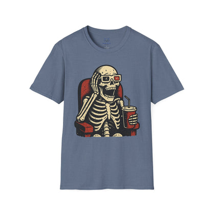 Blue t-shirt with a skeleton design wearing 3-d glasses, sitting in a theater seat, and holding a drink