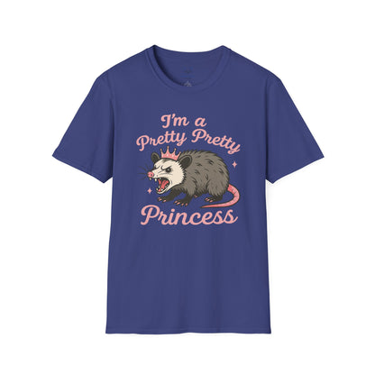 Indigo blue t-shirt with an angry opossum wearing a tiara graphic and 'I'm a pretty pretty princess' pink text.
