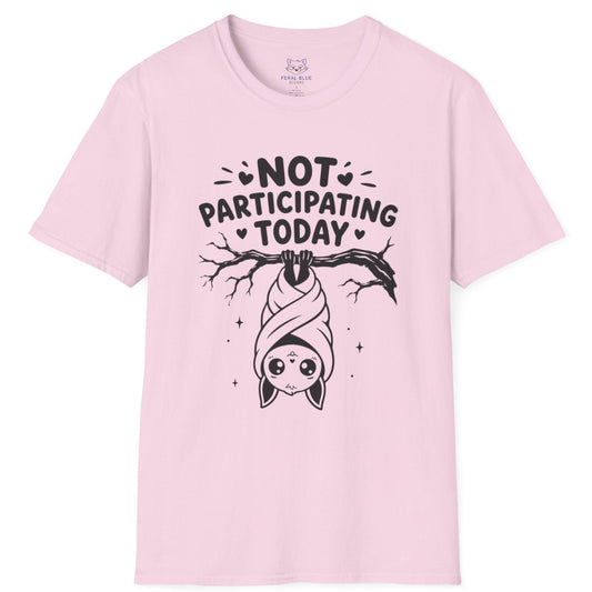Pink t-shirt with a graphic design and text 'Not Participating Today' on a white background
