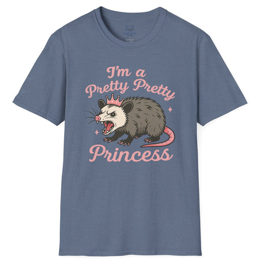 Blue t-shirt with an angry opossum wearing a tiara graphic and pink text 'I'm a pretty pretty princess'.