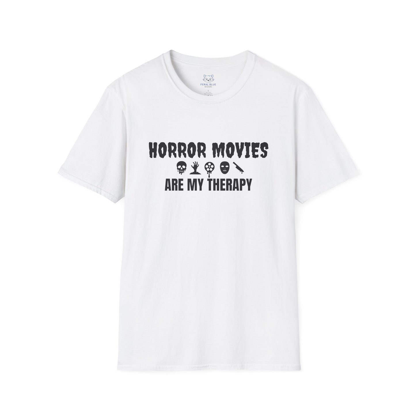 White t-shirt with black text "Horror Movies are my Therapy" and mini horror icon graphics: dripping skull, hand reaching out of ground, dripping film reel, mask, dripping knife.