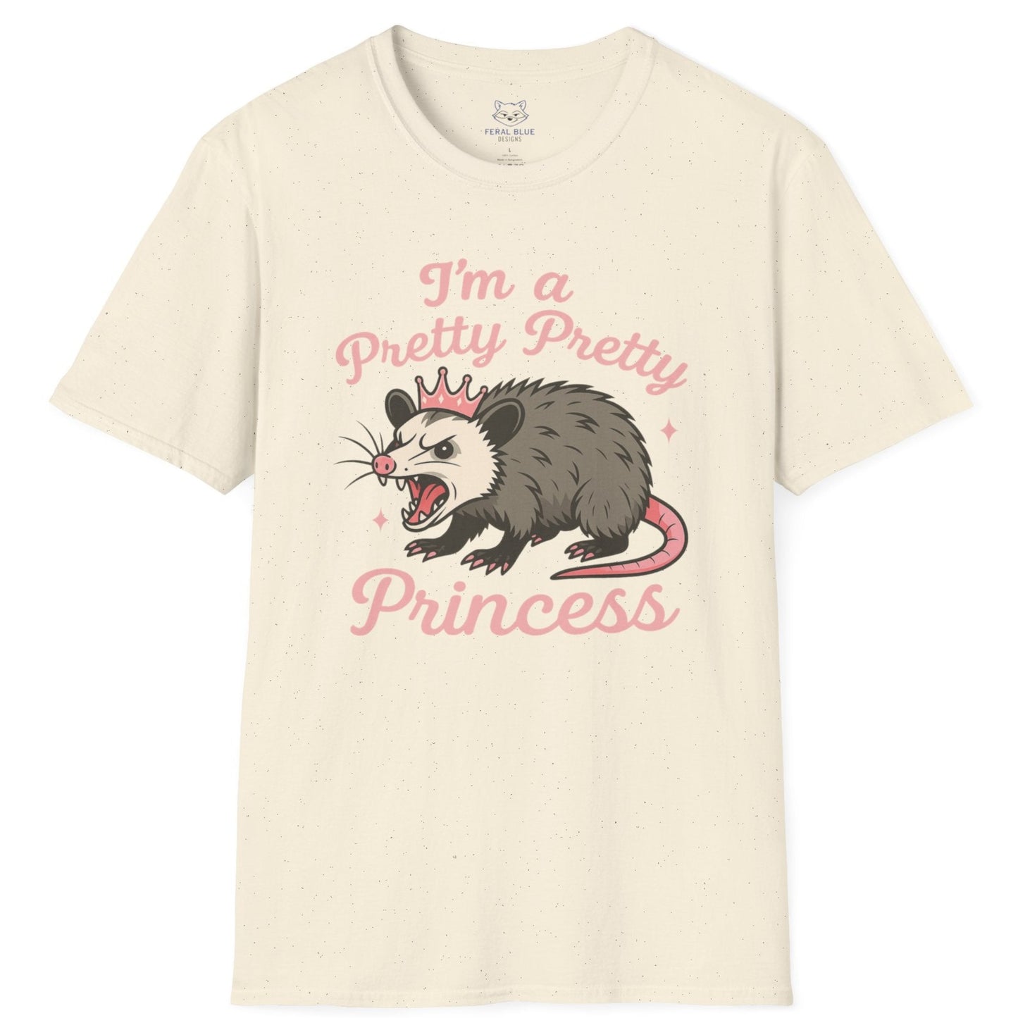 Cream t-shirt with an angry opossum wearing a tiara graphic and 'I'm a pretty pretty princess' pink text.