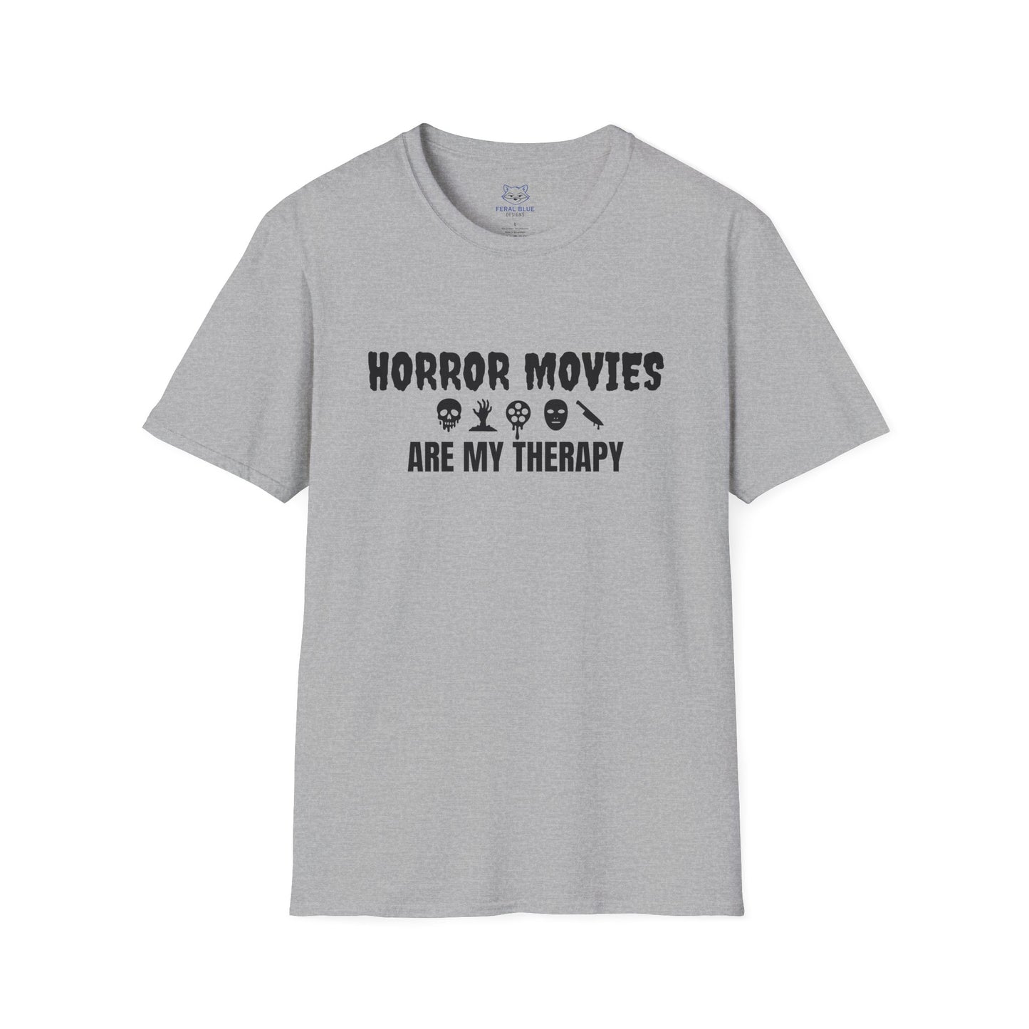 Gray t-shirt with black text "Horror Movies are my Therapy" and mini horror icon graphics: dripping skull, hand reaching out of ground, dripping film reel, mask, dripping knife.