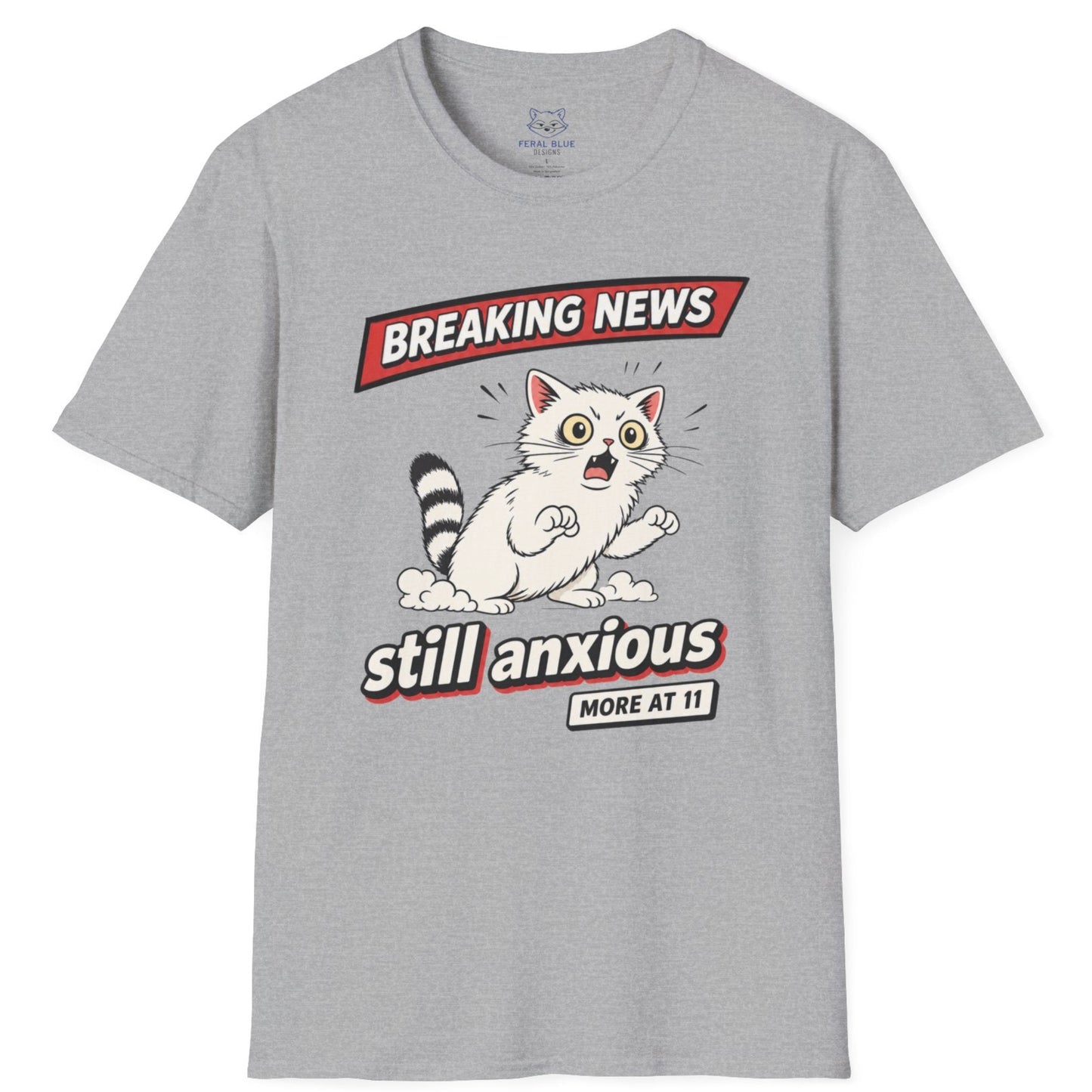 Gray t-shirt with a graphic of a raccoon and text 'Breaking News: Still Anxious' on a white background