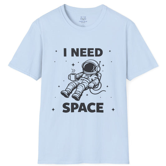 Light blue t-shirt with an astronaut graphic and 'I Need Space' black text on a white background
