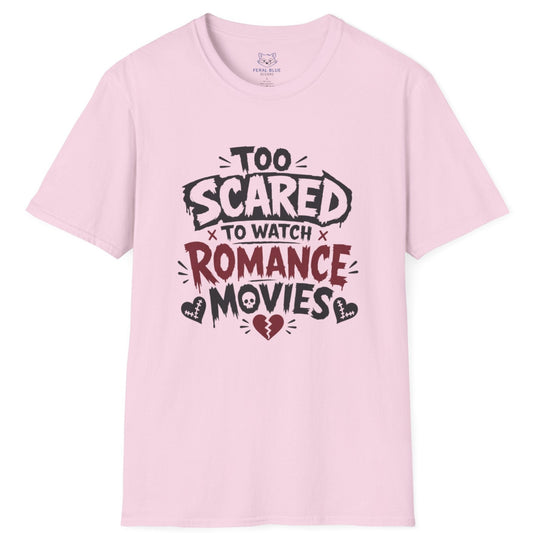 Pink t-shirt with text 'Too Scared to Watch Romance Movies' on a white background