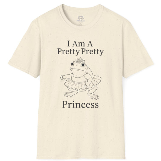 A cream t-shirt with " I am a pretty pretty princess" black text and a black line drawing of a ballerina princess bullfrog. Princess frog wearing a tutu and tiara.