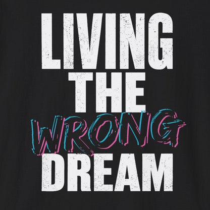 A black short-sleeve crewneck t-shirt with a graphic text print reading 'LIVING THE WRONG DREAM' on the front. The words 'LIVING THE' and 'DREAM' are in white, while 'WRONG' is stylized in white with a pink and blue outline.