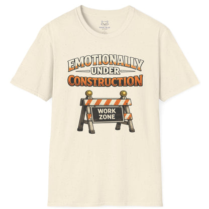 Beige t-shirt with 'Emotionally Under Construction' graphic and construction zone sign on a white background
