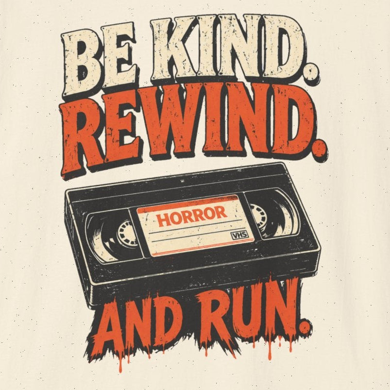 Beige t-shirt with a graphic design of a VHS tape and text 'Be Kind. Rewind. And Run.' on a white background.